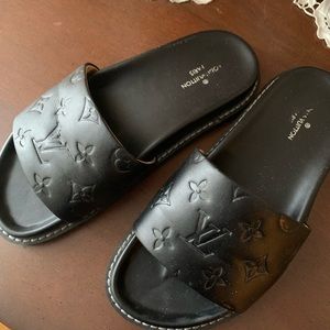 Louis Vuitton black slide ons. Size 7